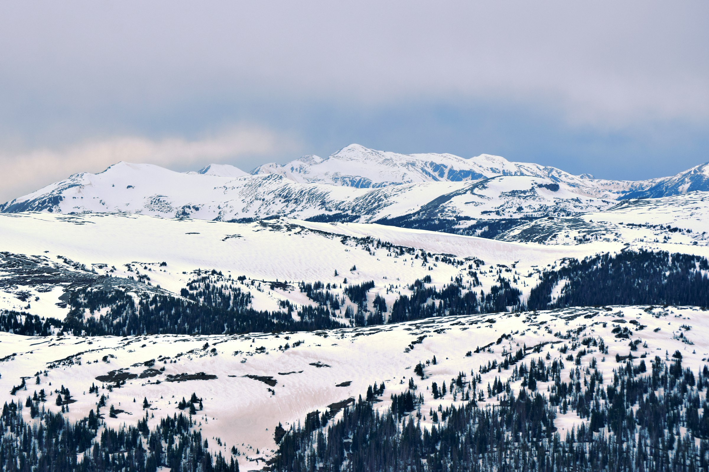 Wide snow-covered high country and mountain range in Colorado